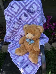 Woollen Rug with Pastel blue and white squares/diamonds